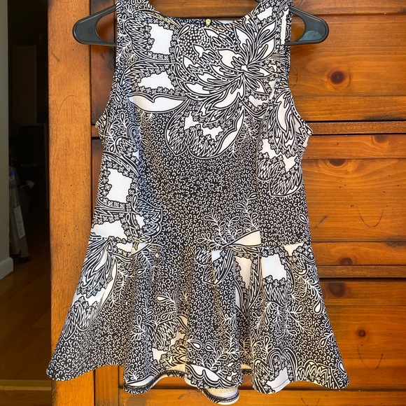 Chic Peplum Top - Picture 1 of 2